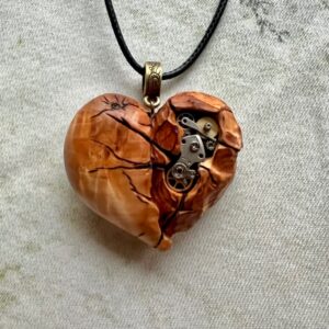 steampunk heart pendant with metal cogs and gears