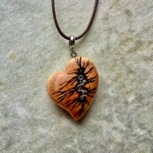 Juniper wooden small steampunk heart with metal cogs and gears