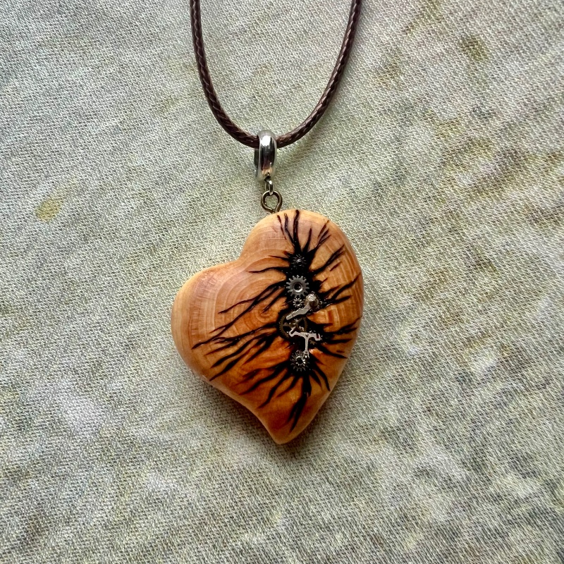 Juniper wooden small steampunk heart with metal cogs and gears