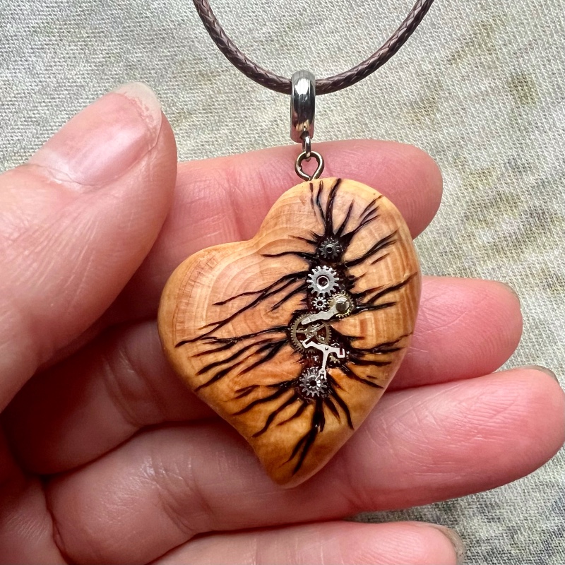 Juniper wooden small steampunk heart with metal cogs and gears