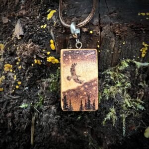 Aurora pendant with a flying bird in a starry sky